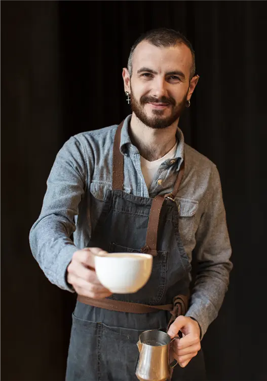 man holding a cup of coffee